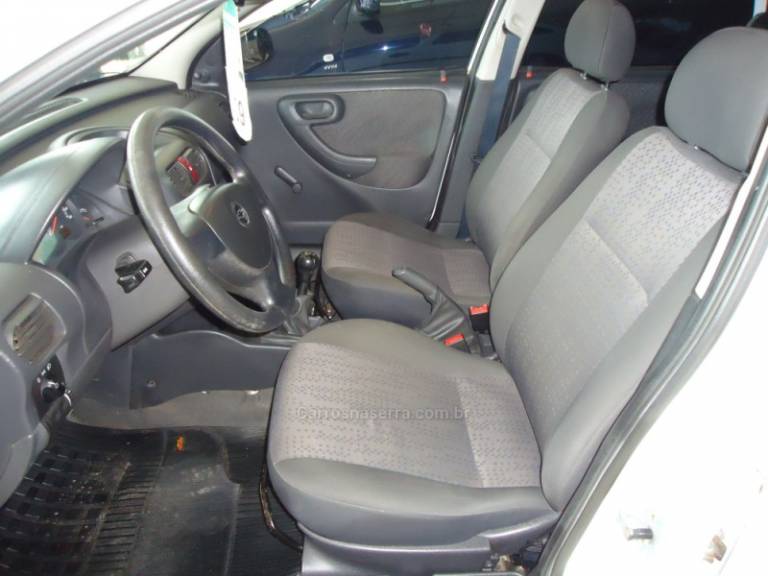 CHEVROLET - CORSA 1.0 MPFI MAXX 8V FLEX 4P MANUAL - 2009/2009 - Branca - R$ 27.823,00