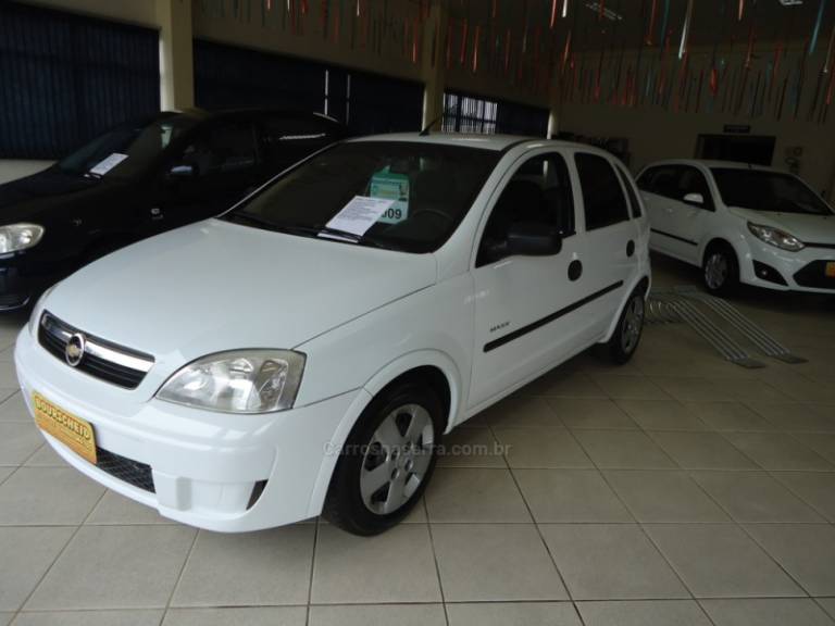 CHEVROLET - CORSA 1.0 MPFI MAXX 8V FLEX 4P MANUAL - 2009/2009 - Branca - R$ 27.823,00