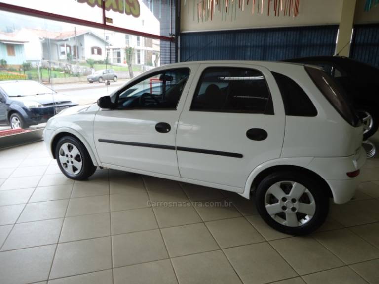 CHEVROLET - CORSA 1.0 MPFI MAXX 8V FLEX 4P MANUAL - 2009/2009 - Branca - R$ 27.823,00